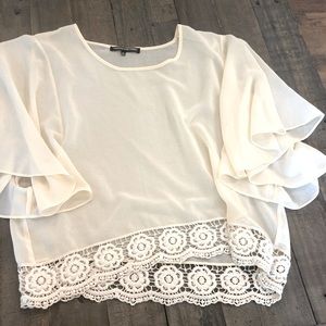 Cream top size M never worn